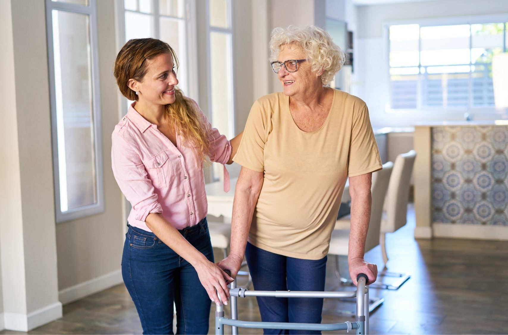 Support worker helping participant in disability support